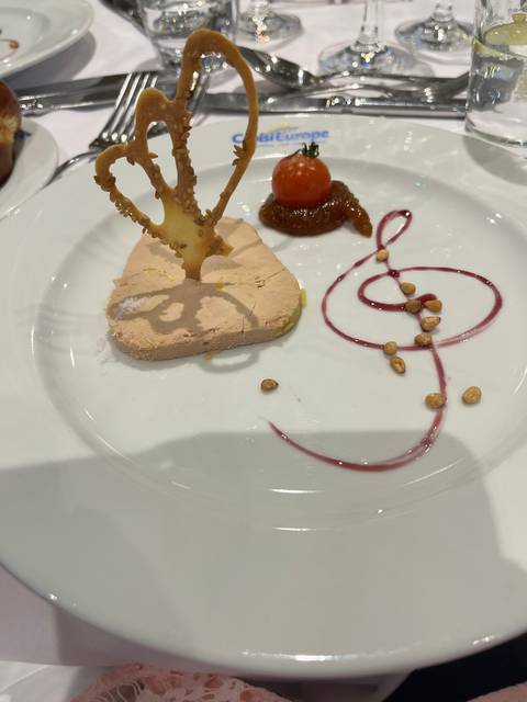 Plated gourmet dish with artistic presentation.