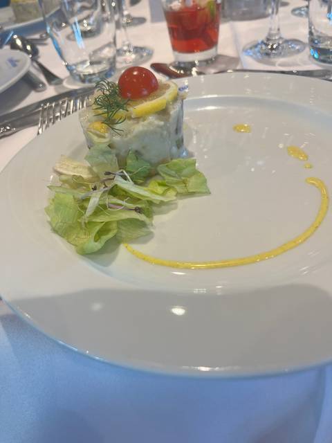 Gourmet salad dish with elegant presentation.