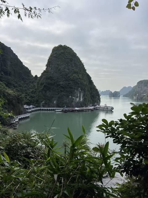       Scenic view of a limestone island and dock.
  