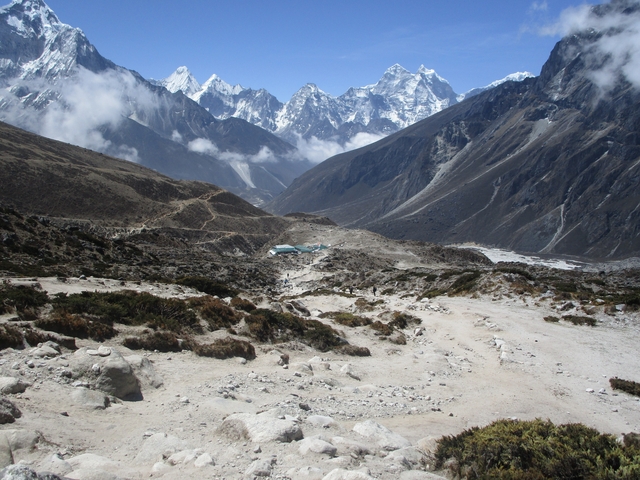 A remote mountainous landscape with a small settlement.