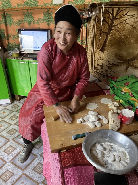       Person preparing traditional Mongolian food
  