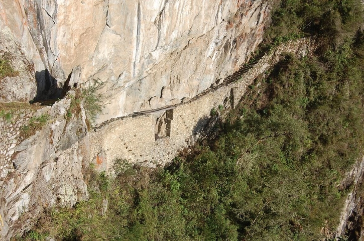 Stone path along a steep cliff.
