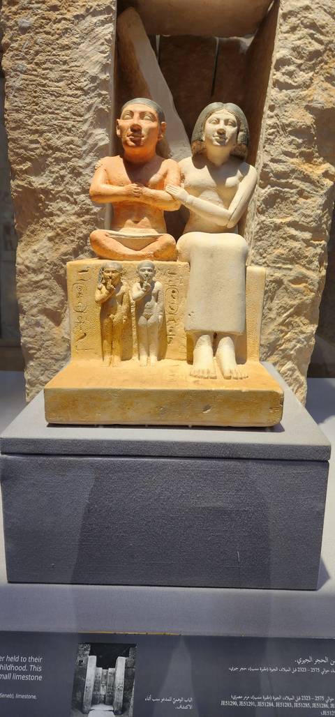 Ancient sculpture with hieroglyphics.