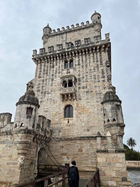 Historic stone tower with detailed architectural features.