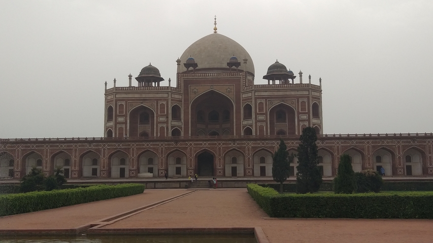 Historic mausoleum surrounded by gardens