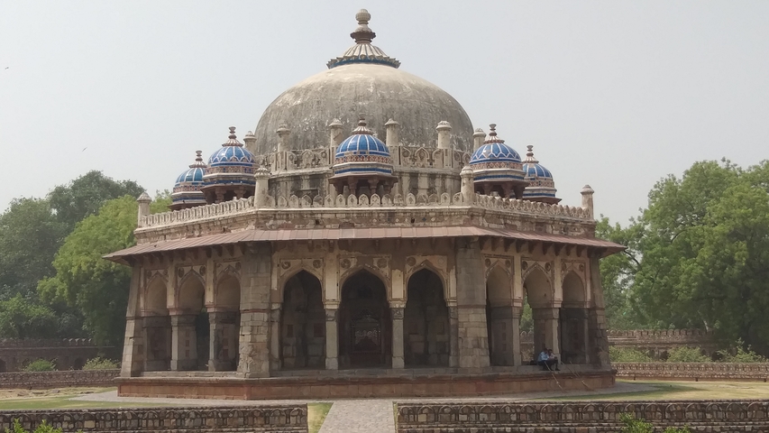       Historic tomb with blue domes
  