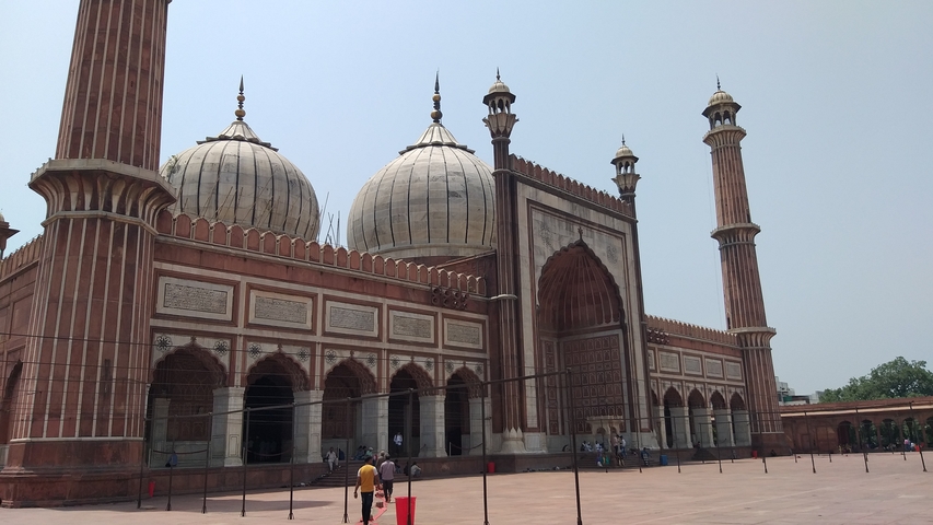       Large historic mosque with tall minarets
  