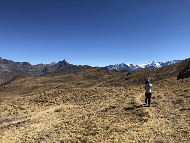 Expansive mountain view with a person