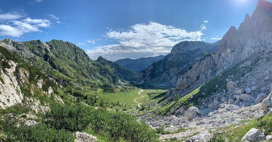 A lush valley with mountain views.