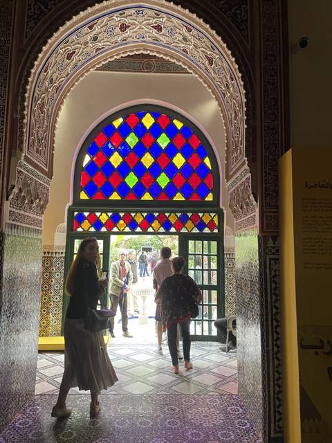 Interior of a building with colorful stained glass
