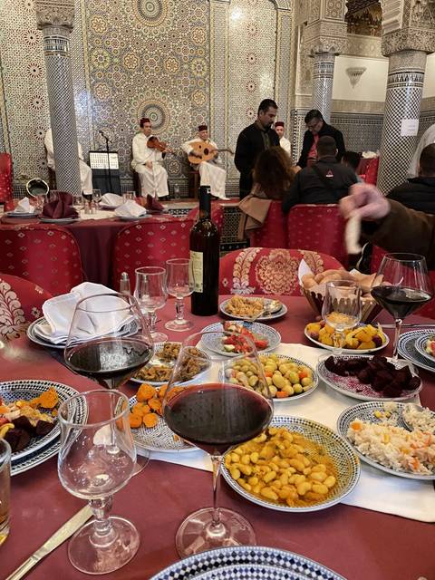       Traditional Moroccan feast inside a restaurant.
  