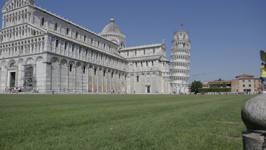       The Leaning Tower of Pisa and surrounding buildings.
  