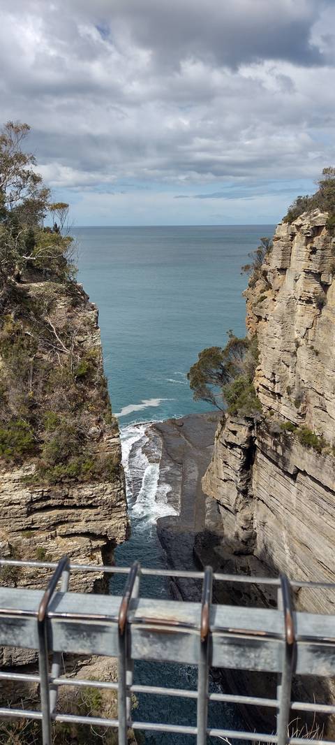Ocean view through rocky cliffs.