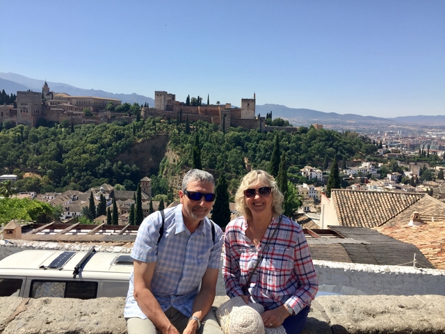 Group posing with Alhambra in the background.