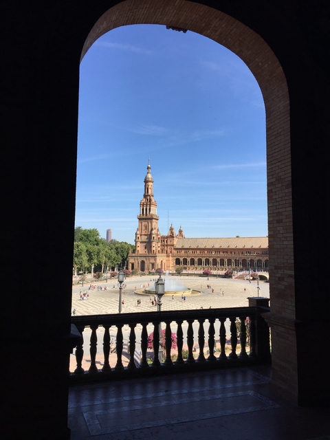 Plaza de España with its distinctive architecture in the background.
