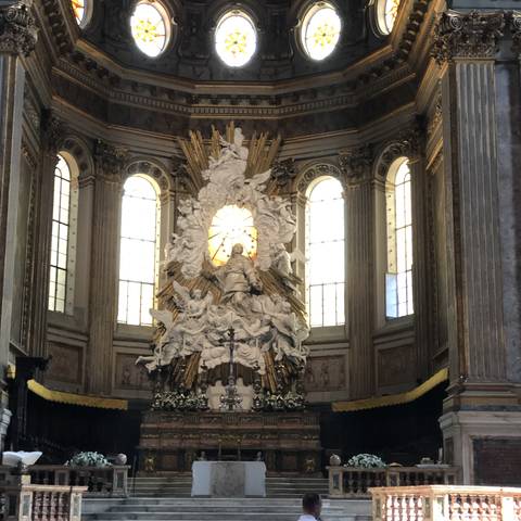       Interior of opulently decorated church or cathedral.
  