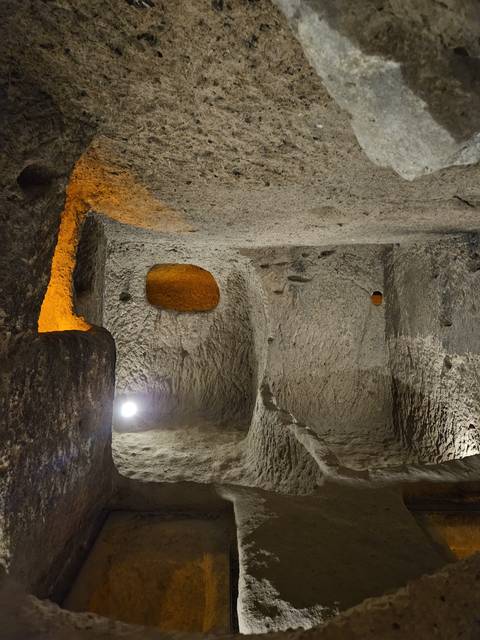       Underground passageway in a cave.
  