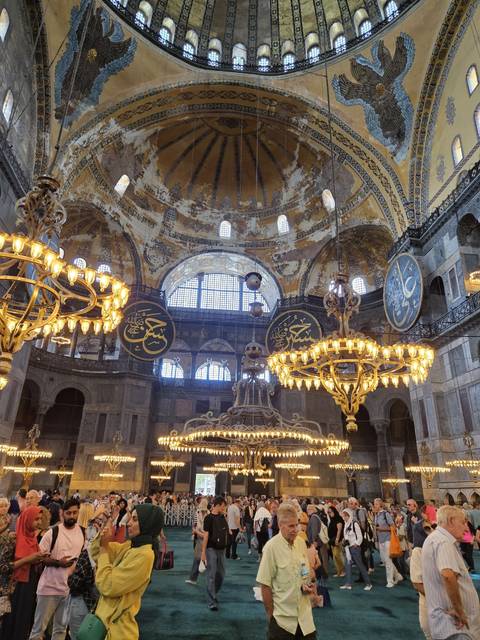       Interior view of a grand historic building.
  