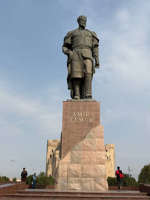 Statue of Amir Temur in a square.