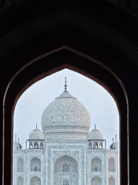 Close-up architectural view of the Taj Mahal.