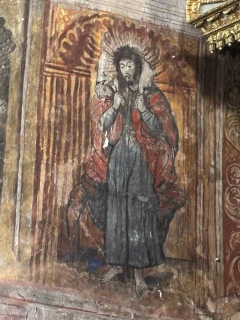 Religious painting on a wall.