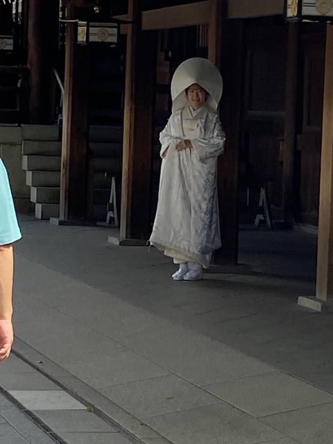 Person in traditional ceremonial attire.