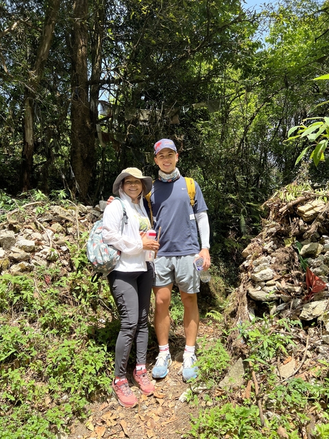 Couple posing on a hiking trail