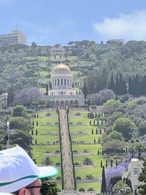       Gardens with a prominent building in the center.
  