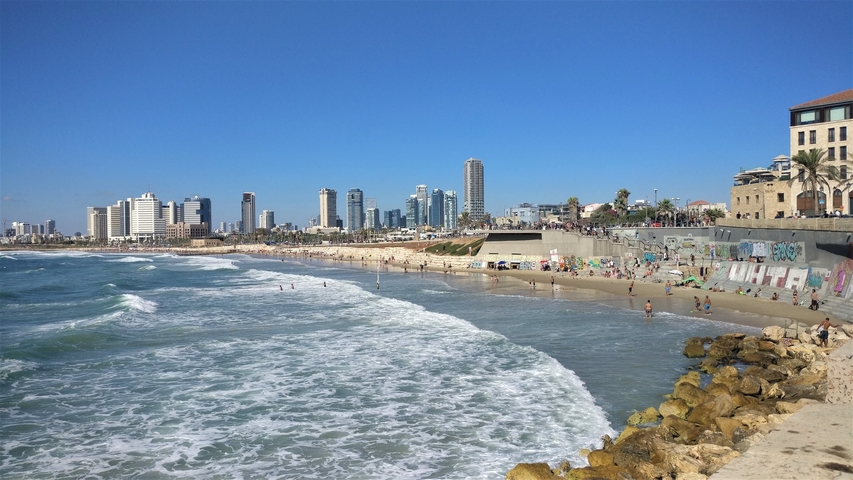 Tel Aviv beach with city skyline