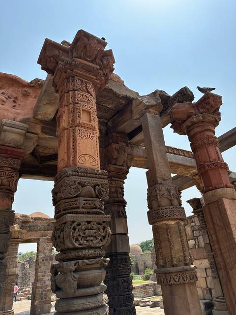 Close-up view of intricately carved stone columns.