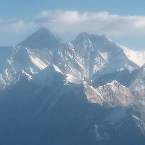       Snow-covered mountain peaks.
  