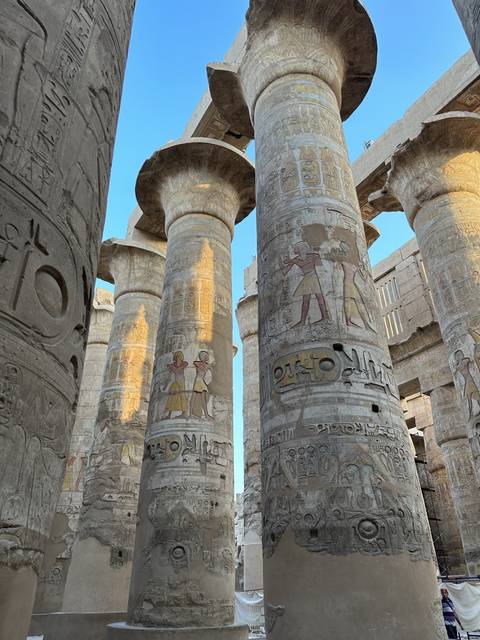 Columns with hieroglyphics in an ancient Egyptian temple.