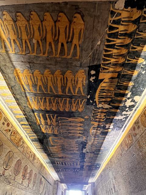       Ancient Egyptian wall art featuring numerous human figures.
  