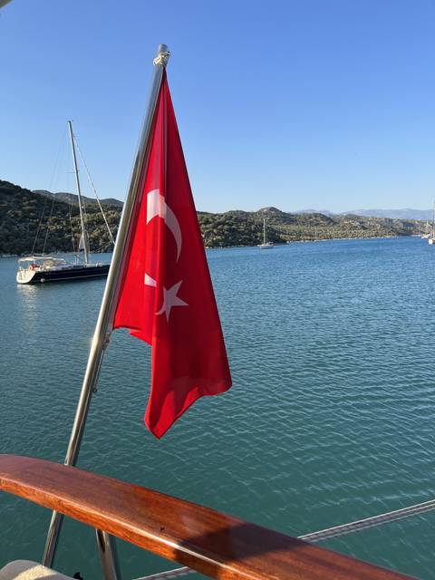 Turkish flag on a boat with waterscape