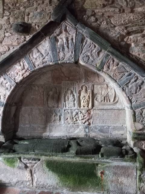 Detailed stone carvings in a historic setting.