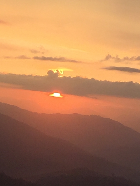 Close-up of a sunset over mountains.
