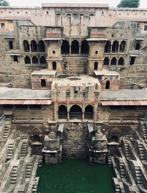       Stepwell with intricate architectural details.
  