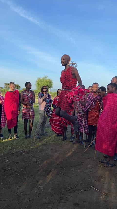 A group of Maasai people in traditional attire.