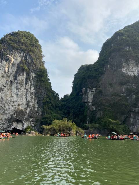 Kayaking through a mountainous region.