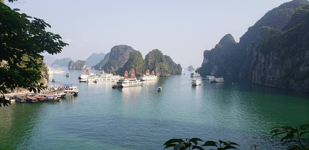 Halong Bay with boats and limestone karsts