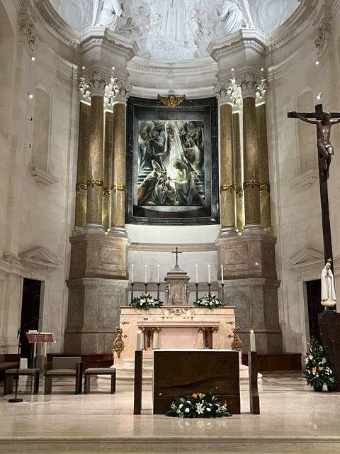 Altar inside a church with ornate decorations.