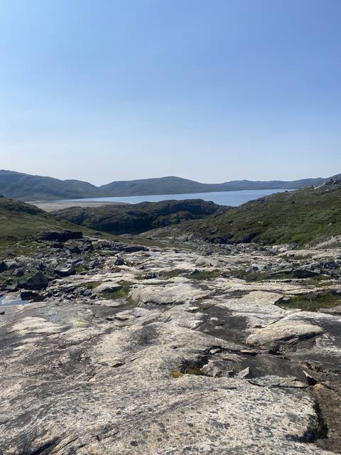       Rocky landscape with hills.
  