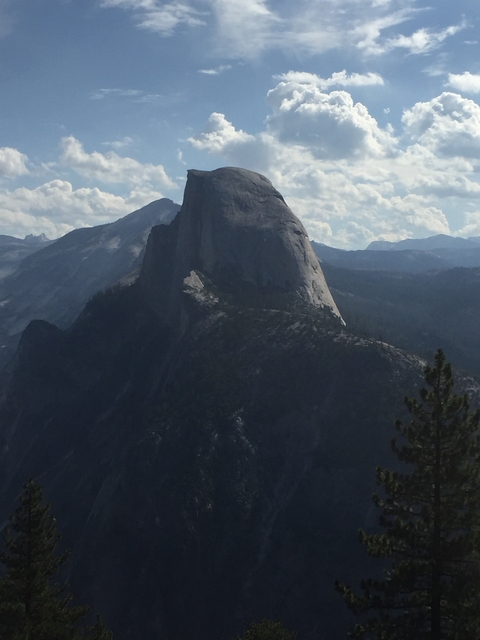 View of a distinctive mountain peak under a cloudy sky