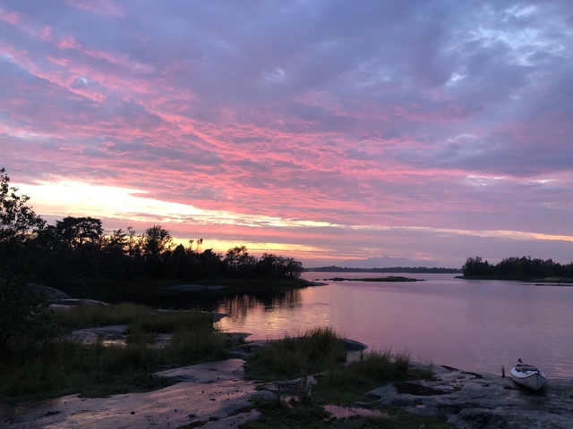       Picturesque sunset with colorful sky over a lake
  
