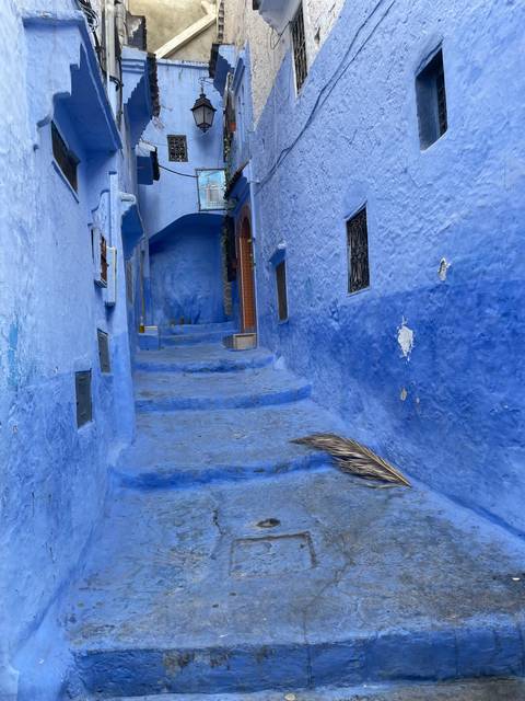 Blue alleyway in a historical town.