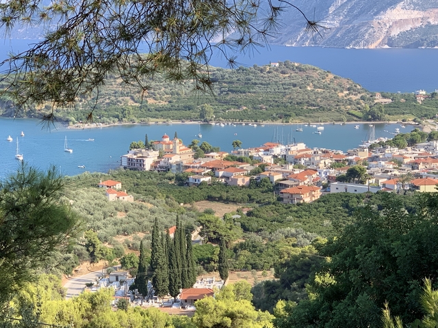 Scenic view of a seaside town with a harbor