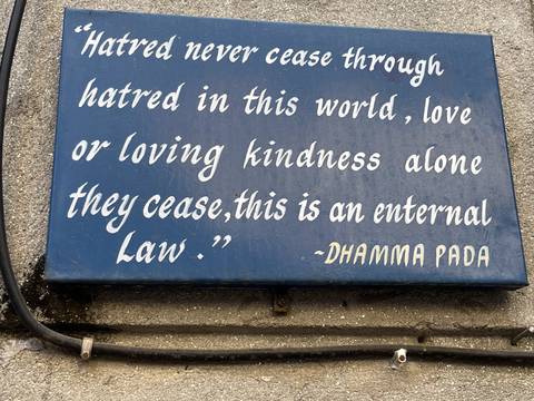       Sign with text about kindness and love.
  