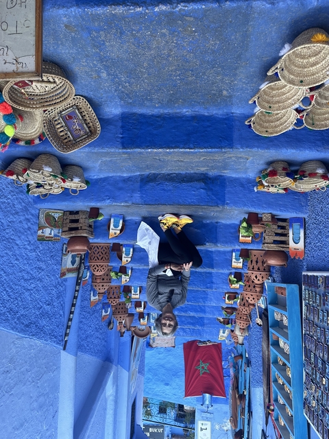       Assortment of souvenirs on blue steps.
  