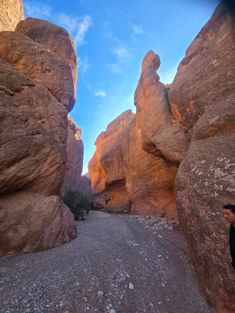       Natural rock formation with a clear blue sky.
  