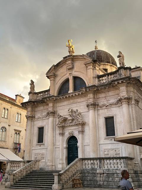       Historic building with ornate decorations.
  